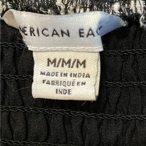 Aeo Sweetheart neck Skinny straps
Ruched details
Smocked details
Plaid pattern - Picture 8 of 8